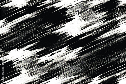 Black and white grunge texture. Brush strokes. Vector grunge overlay texture. Black and white background. Abstract monochrome image includes a faded effect in dark tones.