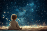 Baby gazing at the stars at night
