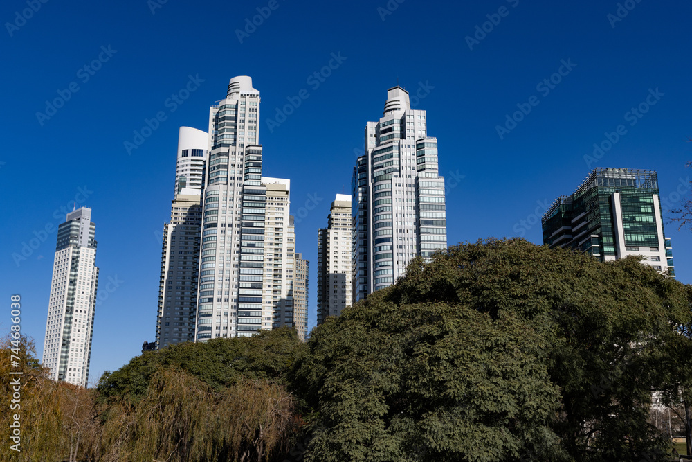 Fototapeta premium Modern Residential Skyscrapers and Green Trees in Puerto Madero of Buenos Aires Argentina