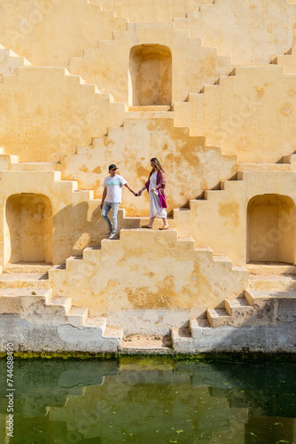 Couple at ancient stepwell in Jaipur