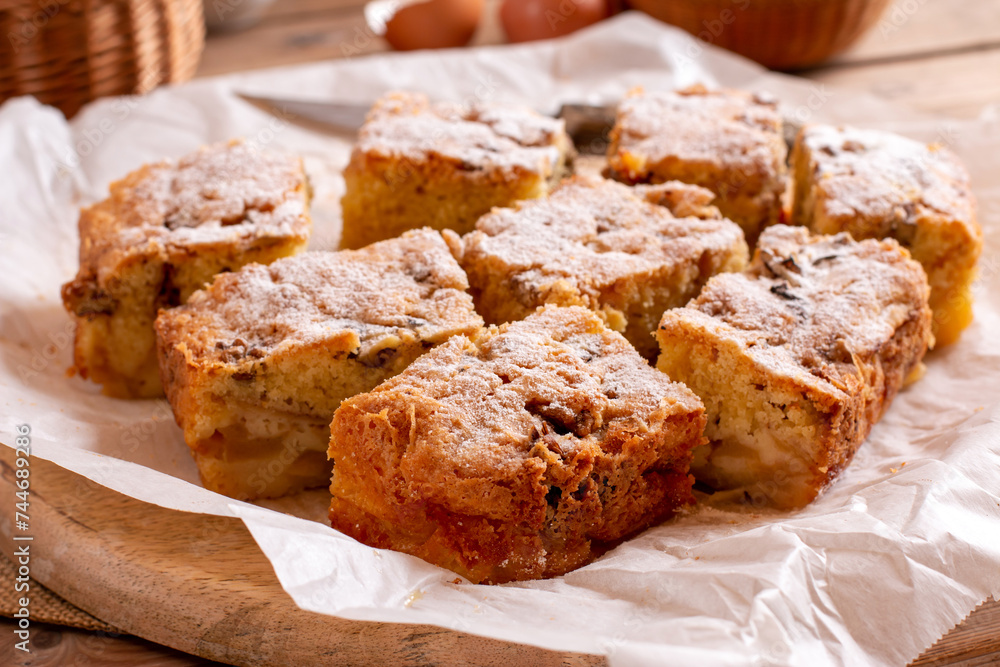 Fresh sponge cake with apples. Chiffon biscuit on table