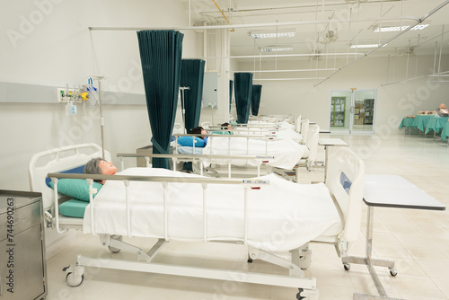 Patient dummy for nurse or doctor student study in university.Patient mannequin on patient bed for teaching in the medical ward. © arcyto