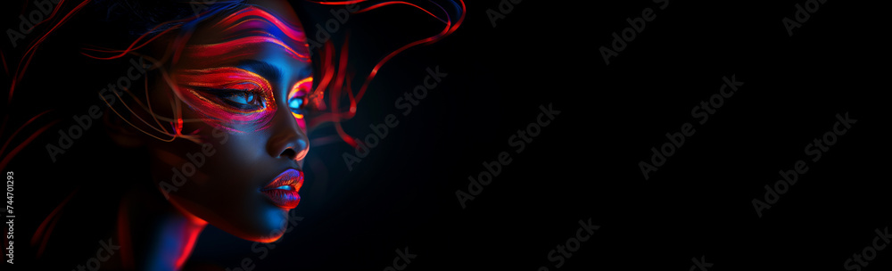 Portrait of a woman with glowing lights and dark background.