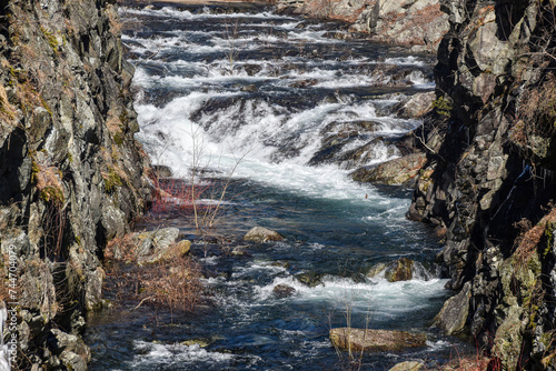 water cascading over rocks  in the spillway  of the quabbin photo