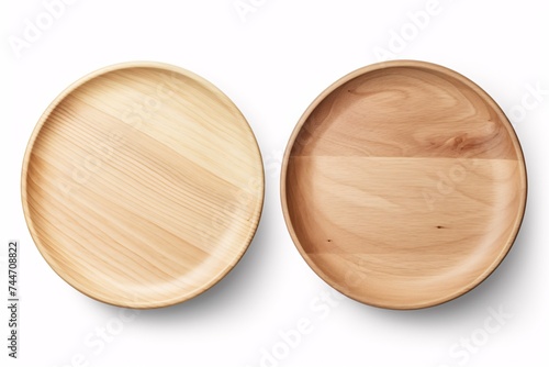 Aerial and viewpoint of vacant wooden platter on a blank backdrop.