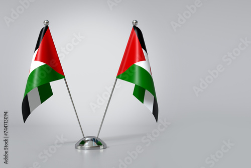 Double Sahrawi Arab Democratic Republic Table Flag on Gray Background. 3d Rendering photo