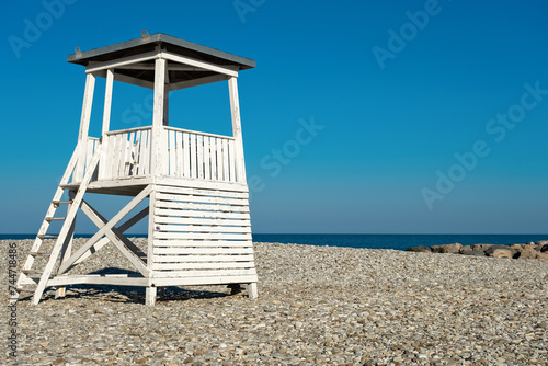 Lifeguard tower on the city beach in the morning in the resort © Ms VectorPlus