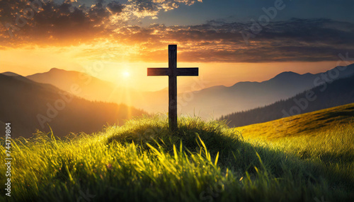Silhouette Christian cross on grass in sunrise, symbolizing hope and faith in divine grace photo