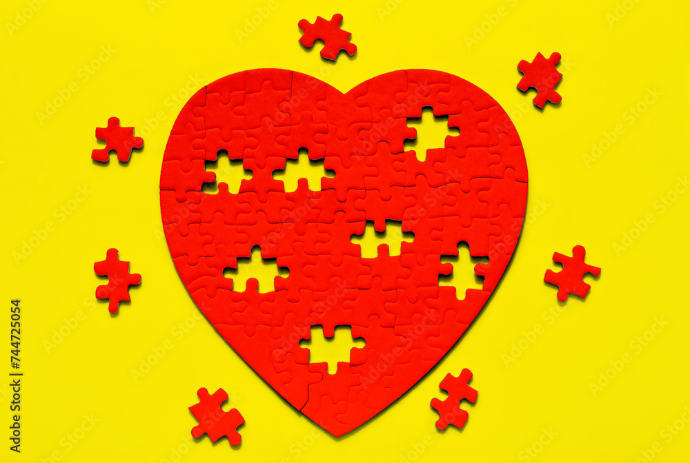 Red Heart Puzzle Unfinished on Yellow Red Heart Puzzle Unfinished on Yellow