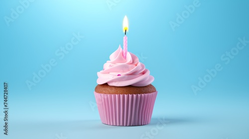 Cupcake with candle. Pastel blue background.  Creative birthday concept.