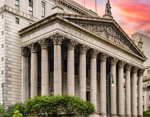 New York, USA; June 3, 2023: New York state supreme court building, is located in New York City (USA), under a beautiful sunrise or sunset.