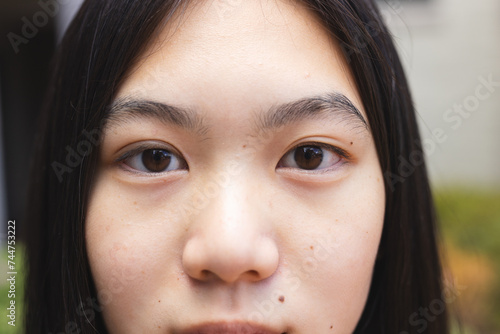 Close-up of a teenage Asian girl's face photo