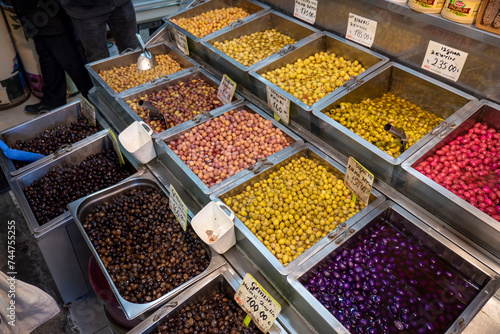 Olive shop selling green and black olives, a wide variety of pickled olive types,