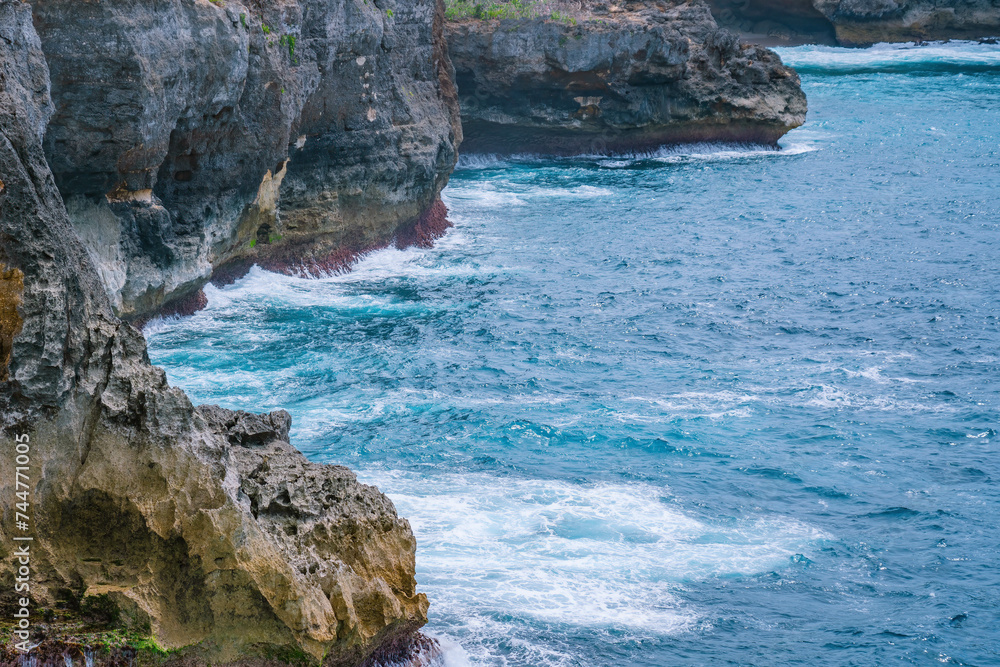 Nusa Penida Island, Bali, Indonesia, Angel's Billabong, top attraction tourist spot with beautiful tide pool and breathtaking view of nature. Close up photo of shoreline