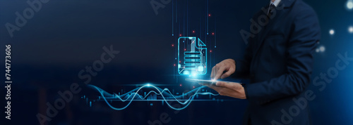 Document Management: Businessman Uses Tablet on Integrated Global Networking, Organizing, Storing, Retrieving, and Sharing Documents, Developing Smart Solutions from Digital Technology.