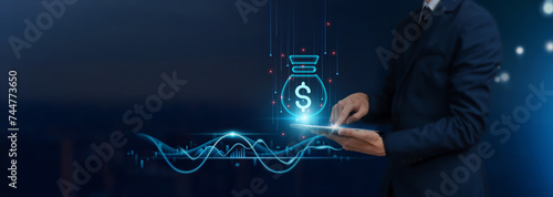 Obraz na plátne Investment: Innovative Concept, Businessman uses Tablet on Investment Icon Global Networking, Strategic Analysis, Market Trends, Financial Growth, Develop Smart Solutions from Digital Technology