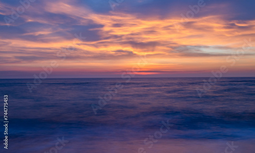 sunset at the beach © максим тищенко