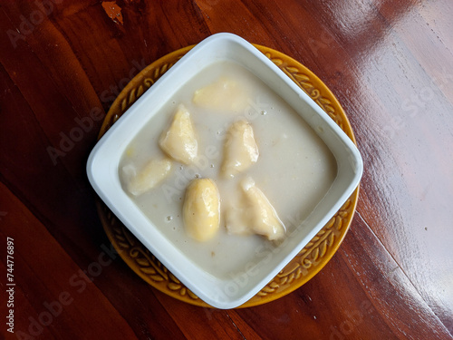 delicious sweet banana soup. In Indonesia it is called kolak pisang photo