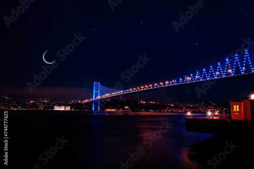 Bosphorus and Bosphorus Bridge under night lights.