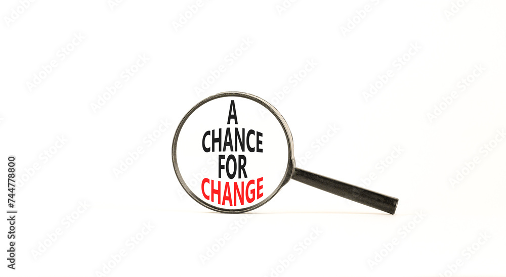 A chance for change symbol. Concept words A chance for change on beautiful magnifying glass. Beautiful white table white background. Business A chance for change concept. Copy space. A chance for change symbol. Concept words A chance for change on beautiful magnifying glass. Beautiful white table white background. Business A chance for change concept. Copy space.