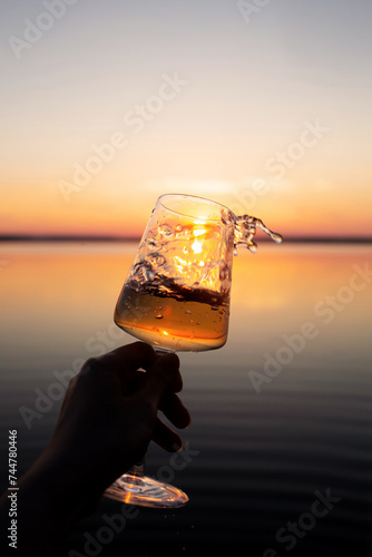 Glass of wine at the sunset