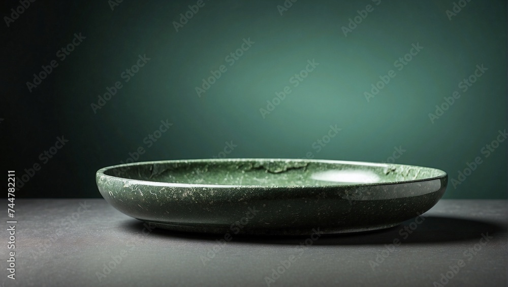 Stone tray isolated on blur green color background Stone tray isolated on blur green color background