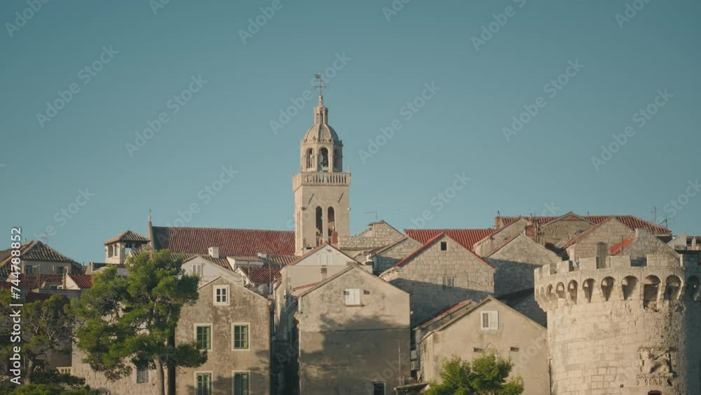 Mediterranean town in Croatia with bell tower and traditional architecture. Sunny summer day. Travelling concept. Mediterranean town in Croatia with bell tower and traditional architecture. Sunny summer day. Travelling concept.