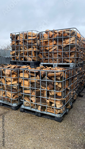 Many Prepared container firewood storage outside package store