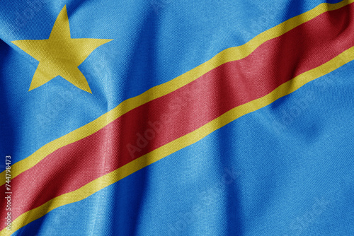 National Flag on Textured Fabric Background. Silk textured flag  realistic wave and flag look. CD  Flag of The Democratic Republic of the Congo
