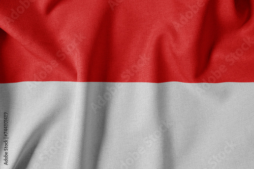 National Flag on Textured Fabric Background. Silk textured flag, realistic wave and flag look. ID  Flag of Indonesia