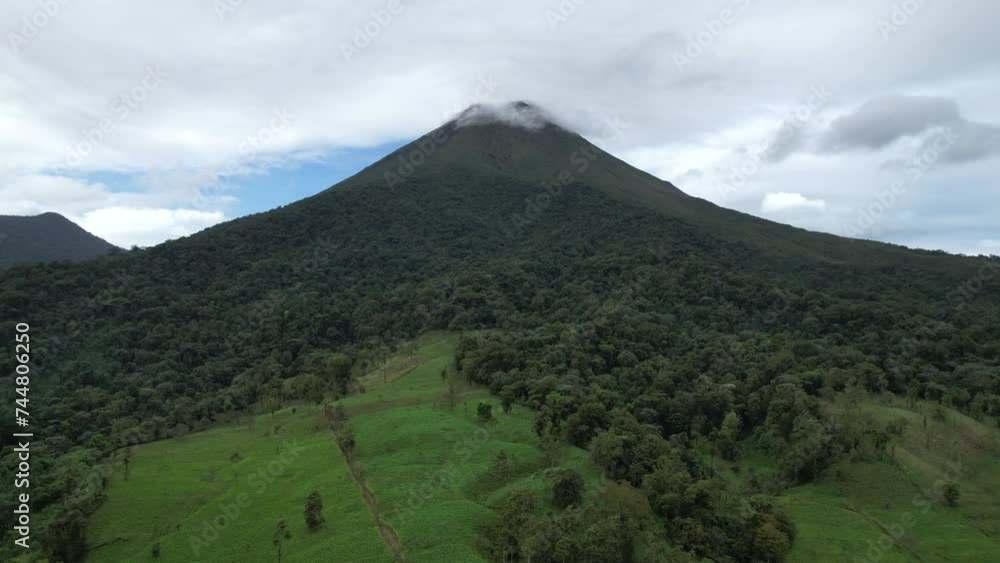 Beautiful cinematic view of the Arenal volcano and the Lagoon in Costa Rica Beautiful cinematic view of the Arenal volcano and the Lagoon in Costa Rica