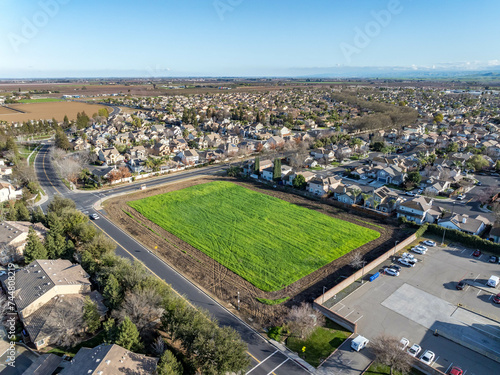 Drone photos over vacant land in a community in a community in northern California. Green space vacant land. Commercial Real Estate