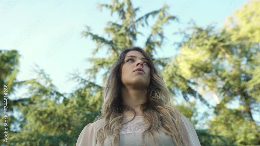 young people searching for life direction: attractive woman looking around young people searching for life direction: attractive woman looking around