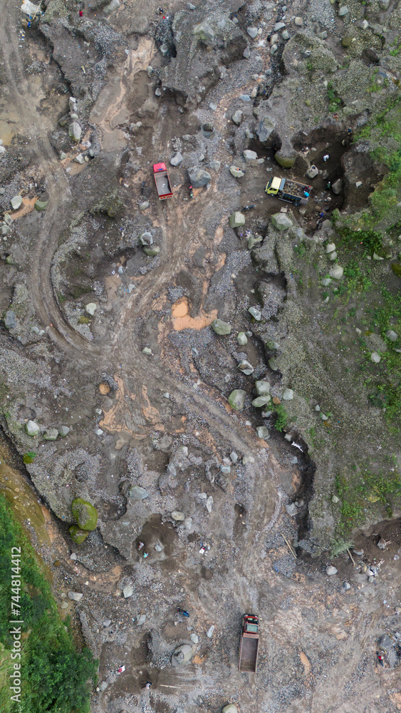 aerial view of sand and stone mining on the slopes of Mount Merapi in Sleman Regency, Yogyakarta aerial view of sand and stone mining on the slopes of Mount Merapi in Sleman Regency, Yogyakarta