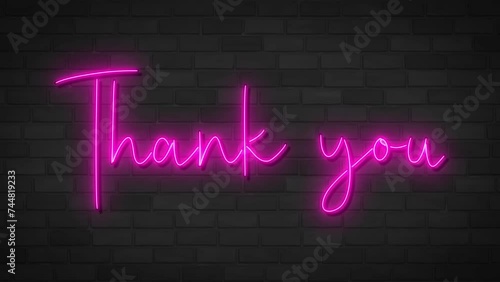 Animated text thank you neon sign on dark brick wall. Thank you digital card, suitable for celebration, wishes, events, message, holiday, festival or for social network.