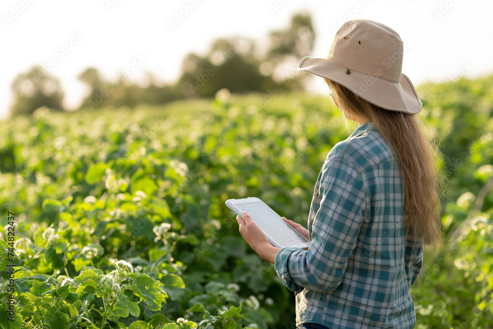 Tech-Savvy Female Farmer Monitoring Crops