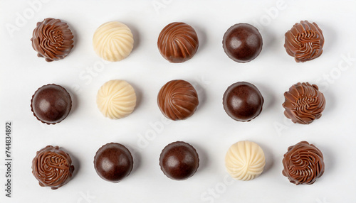 Assortment white, dark and milk chocolate candies. Top view chocolate candy, sweet tasty food