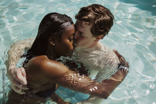 Intimate underwater hug between a young black woman and a white man, serene ripples surrounding them