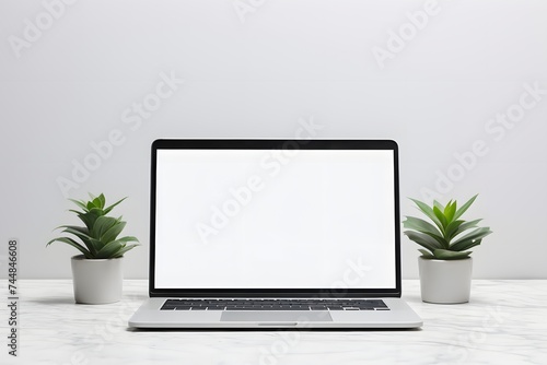 Laptop white blank screen mockup on the table on a white background, Front view
