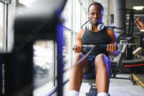 African American man working out in the gym.