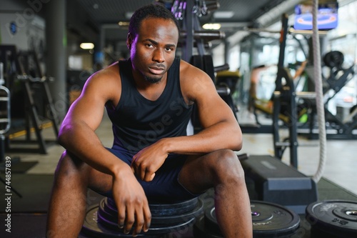 Sports  fitness  healthy lifestyle. African man in the gym.