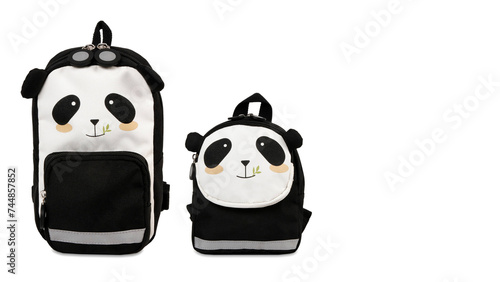 Front view closeup of colorful panda-shaped schoolbags isolated on white copy-space background. (ID: 744857852)