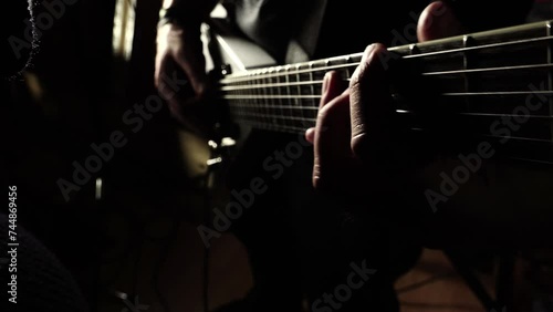 Man lead guitarist playing electrical guitar