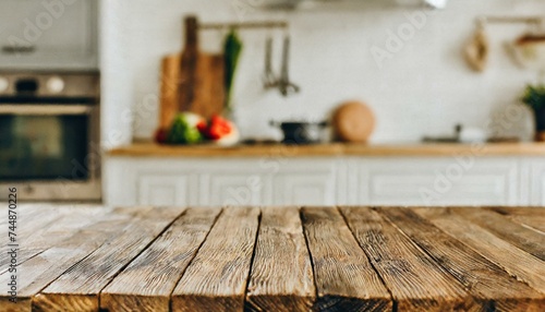 Wooden table positioned against a kitchen backdrop, slightly blurred