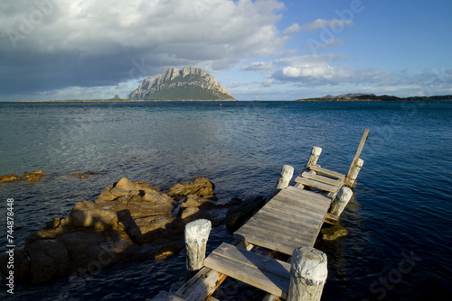 wooden pier on the beach, Porto San Paolo, Isola di Tavolara. Olbia Tempio. Sardegna, Italia photo