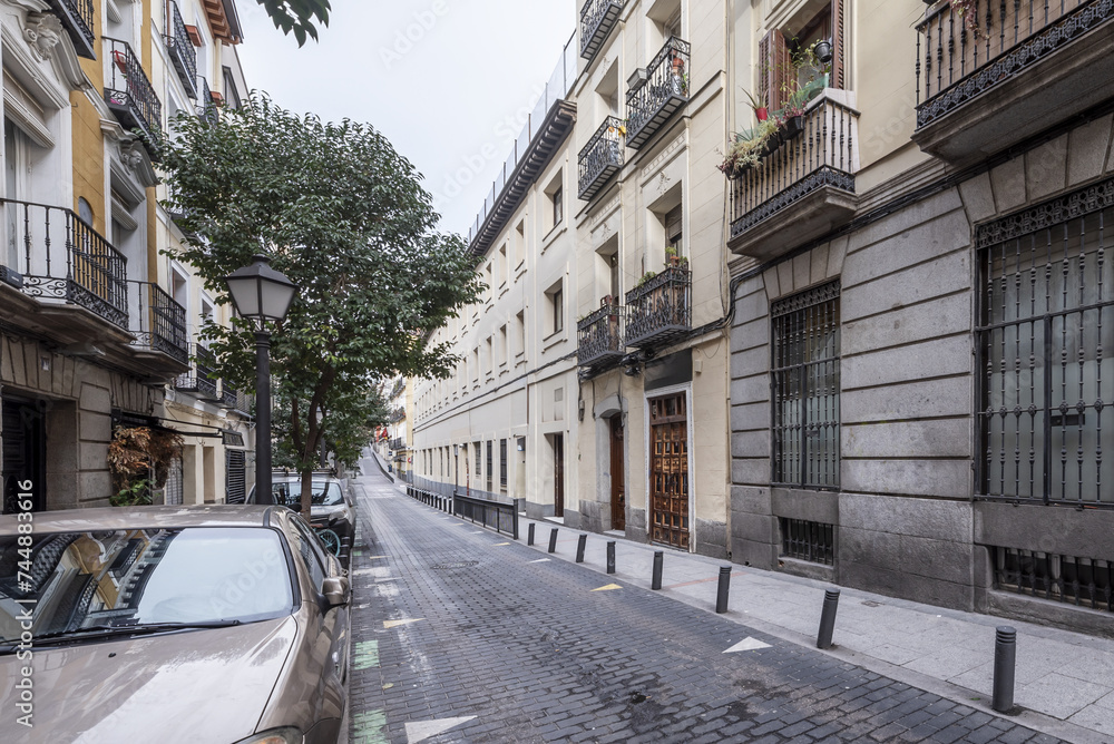 A street in the central district of Madrid with old urban residential buildings