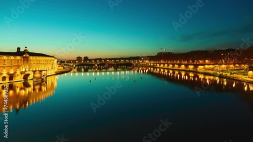 Timelapse Bridge of Catalans (Amidonniers Bridge) is Toulouse, France bridge crossing Garonne river. It is bridge in arch and stone and reinforced concrete inaugurated in 1908. Architect Paul Sejourne photo