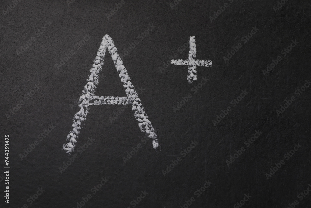 School grade. Letter A with plus symbol on blackboard, top view. Space for text