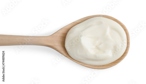 One wooden spoon with mayonnaise isolated on white, top view