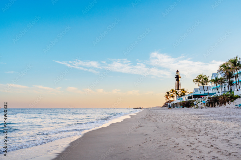 Hillsboro Beach Club, Florida with lighthouse overlooking beach and ocean Hillsboro Beach Club, Florida with lighthouse overlooking beach and ocean